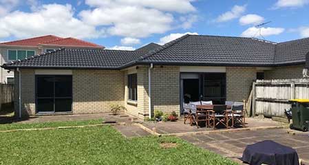 Concrete tile roof after Roofcare restoration